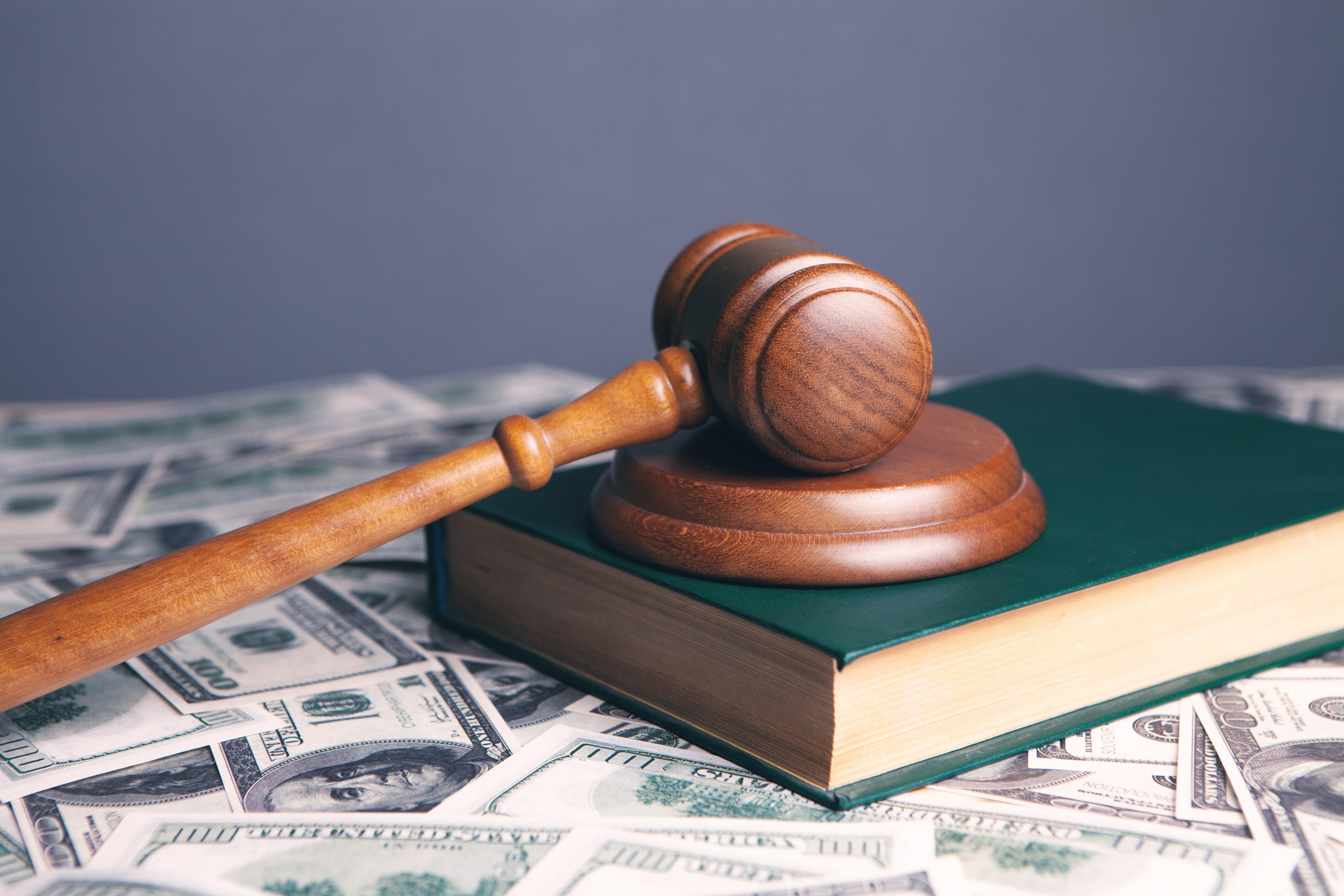 A gavel and a mallet on a book