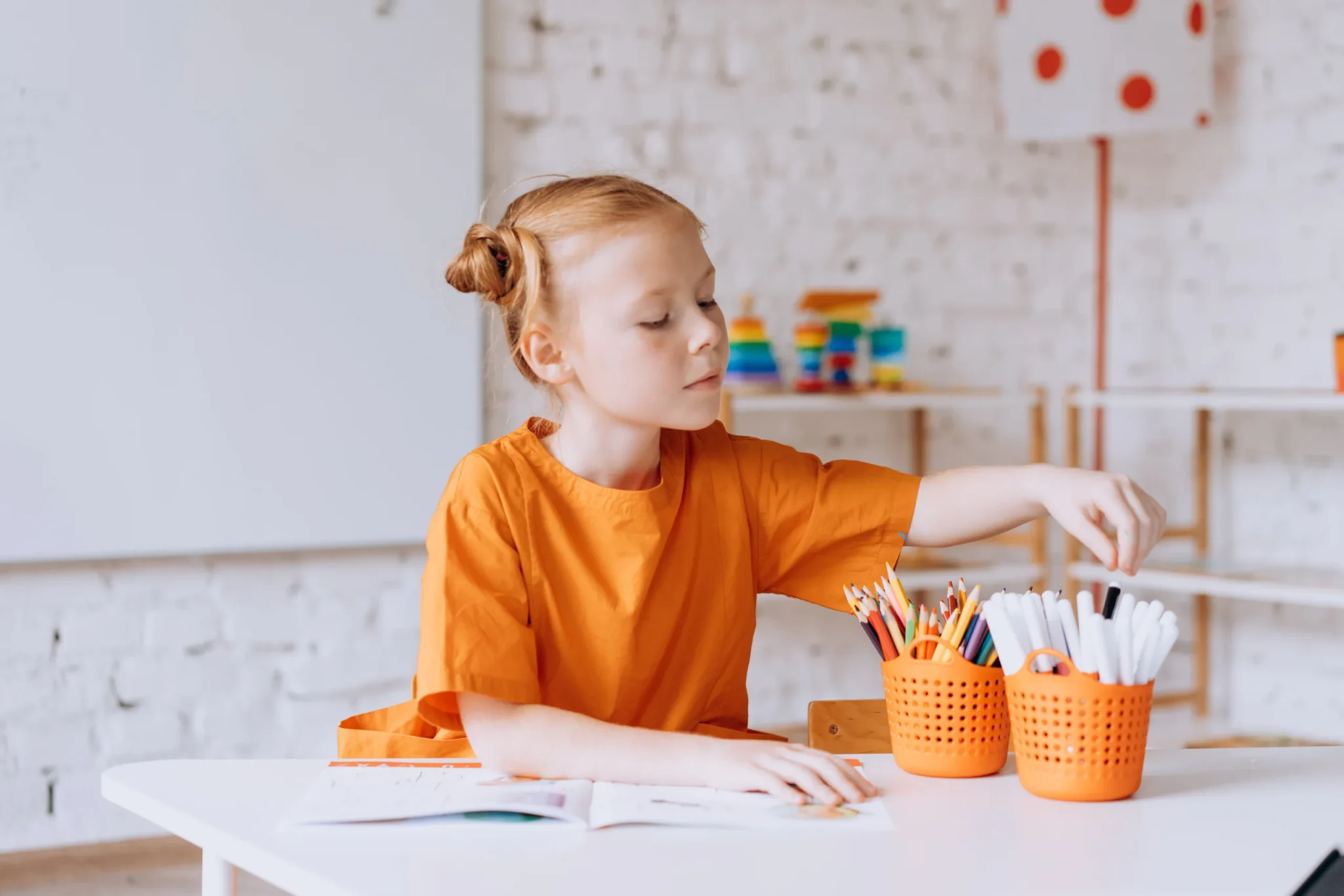 A child behind a desk