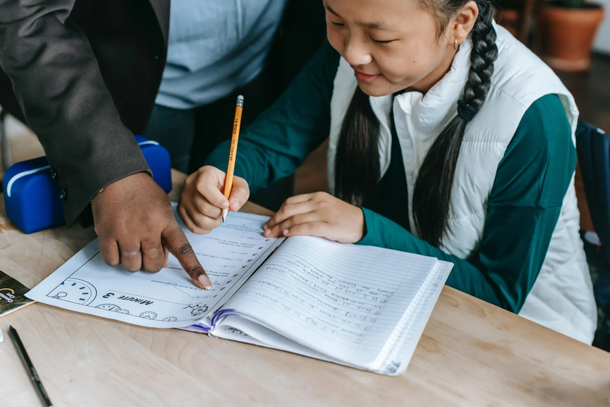 A child writing on a book