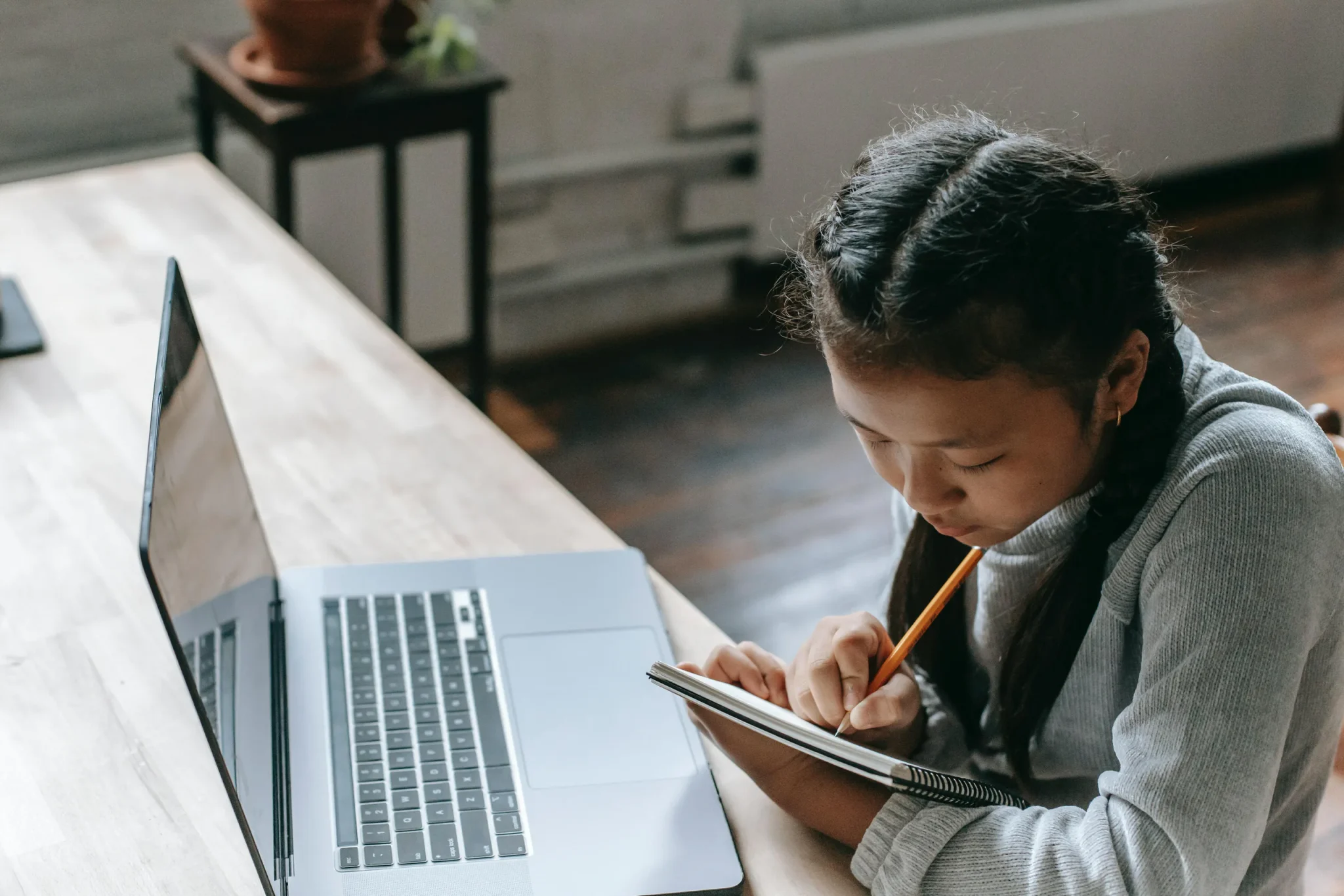 A child writing on a book