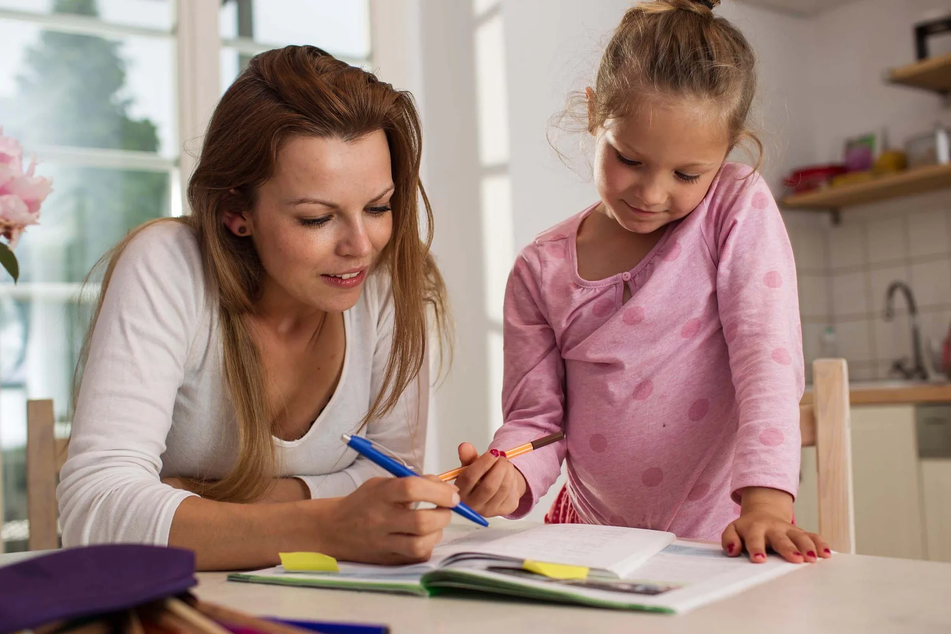 A mother and a child reading