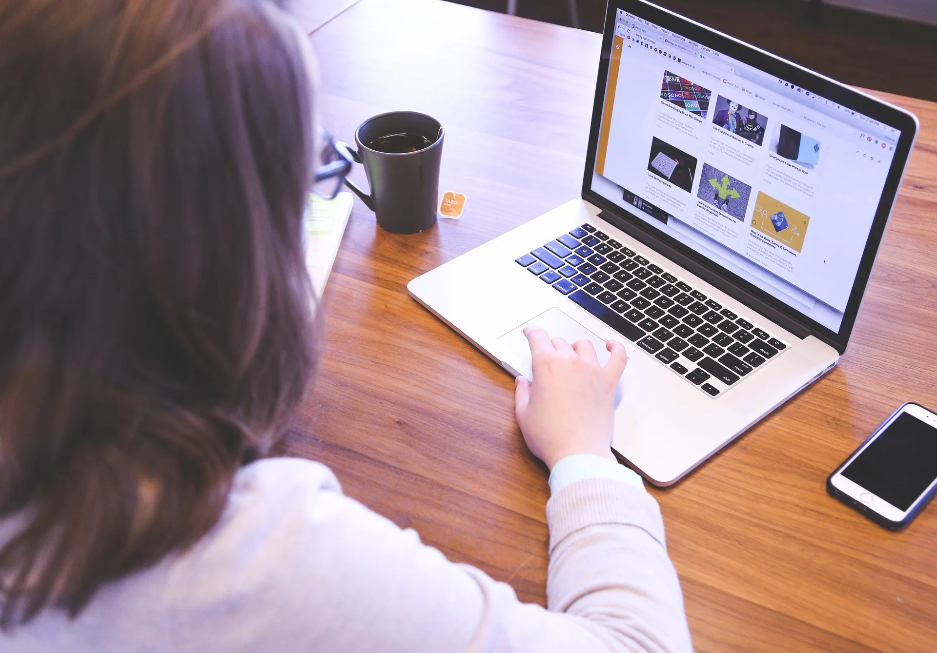 A woman using a laptop
