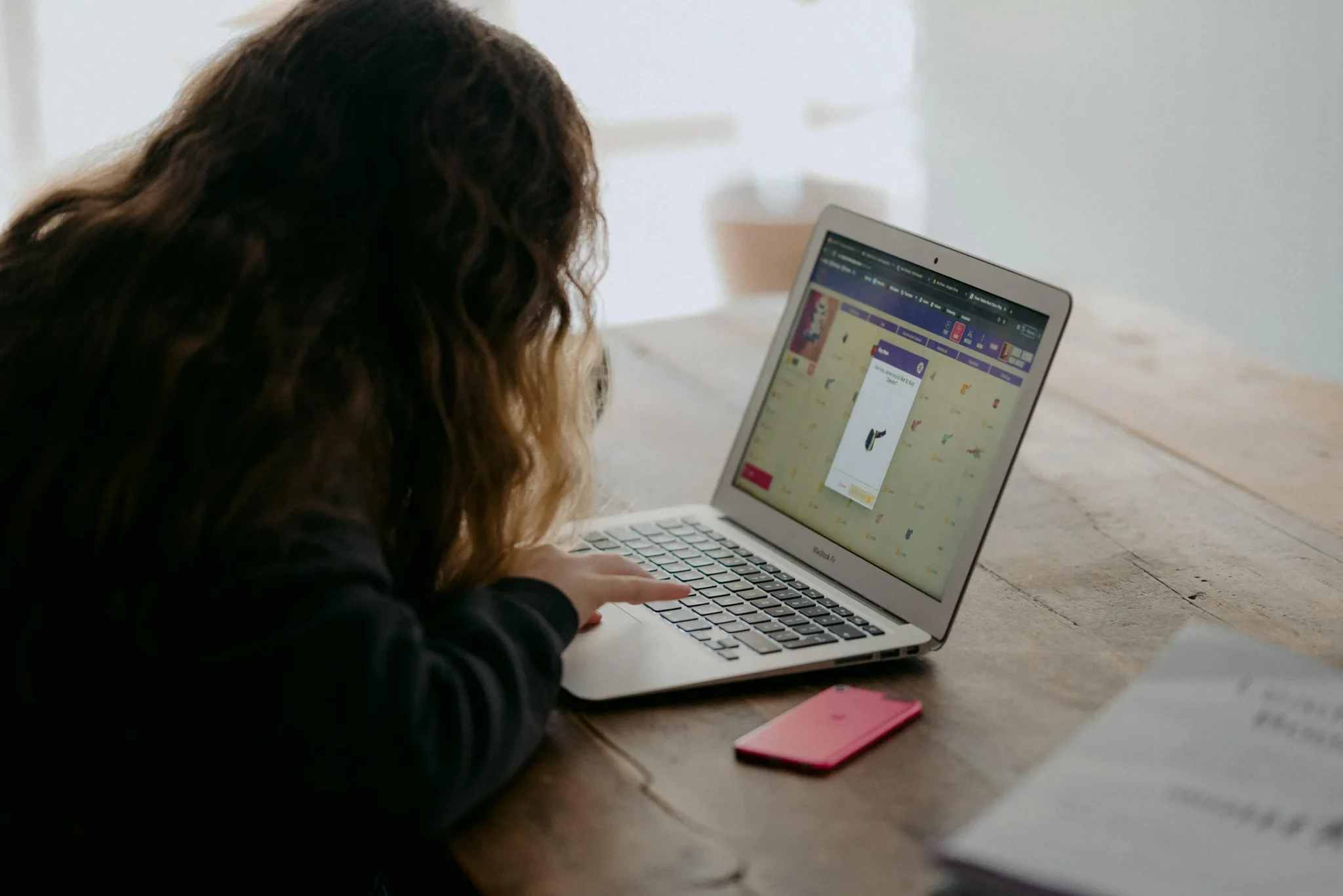 Girl behind a computer