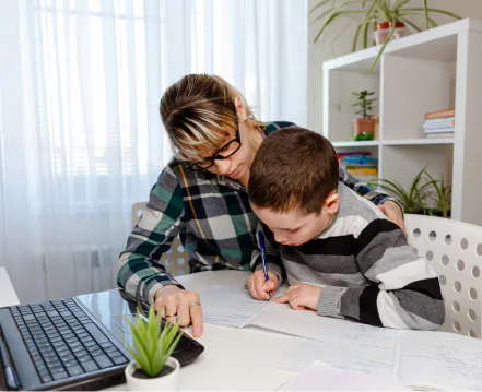 A child behind a desk