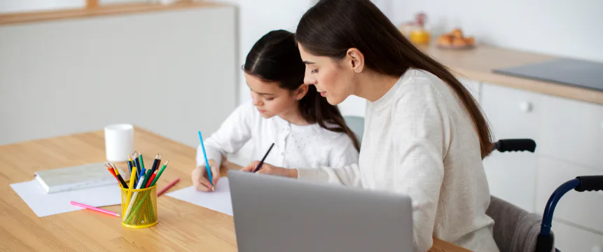 woman and girl writing