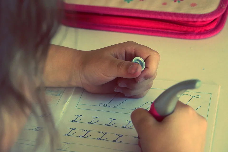 A child writing alphabet