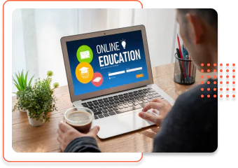 person drinking coffee looking at laptop with online education