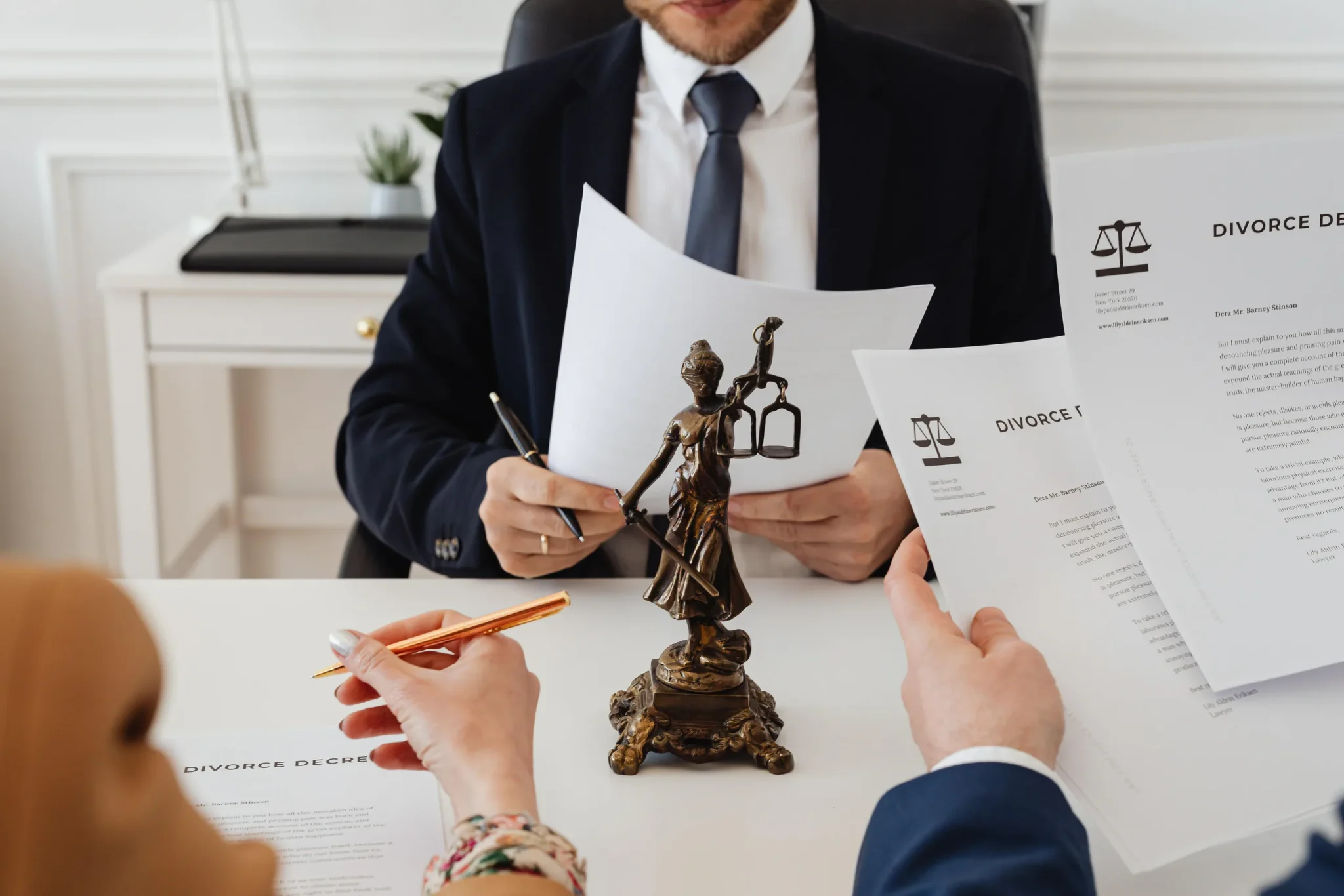 Lawyer and clients reading a contract