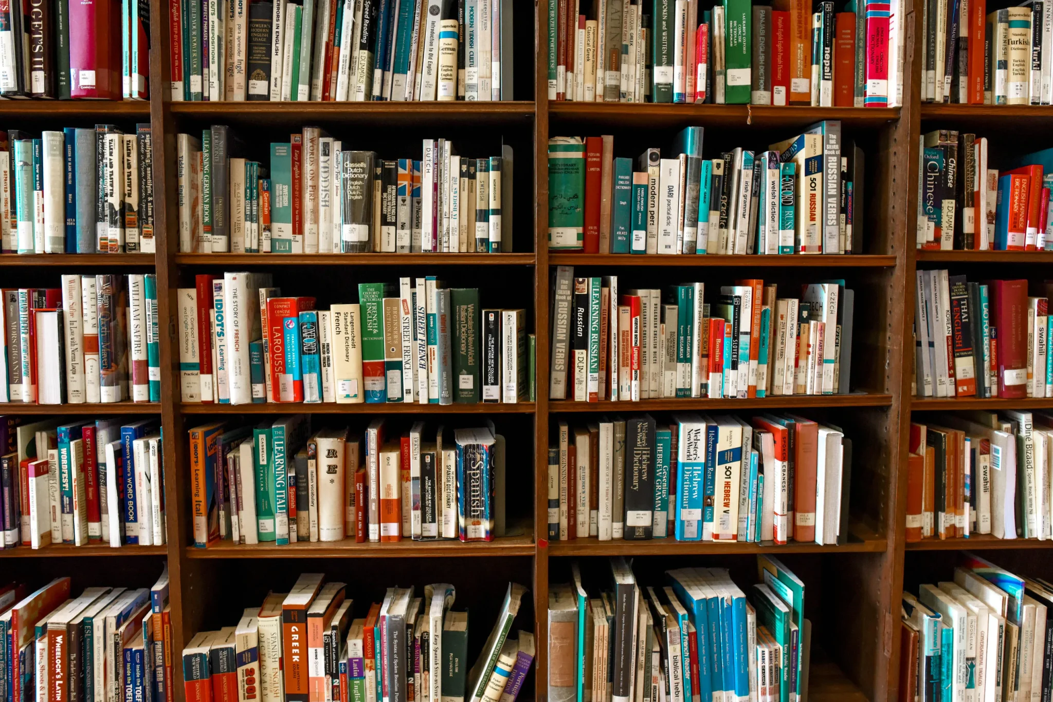 A library shelf with many books