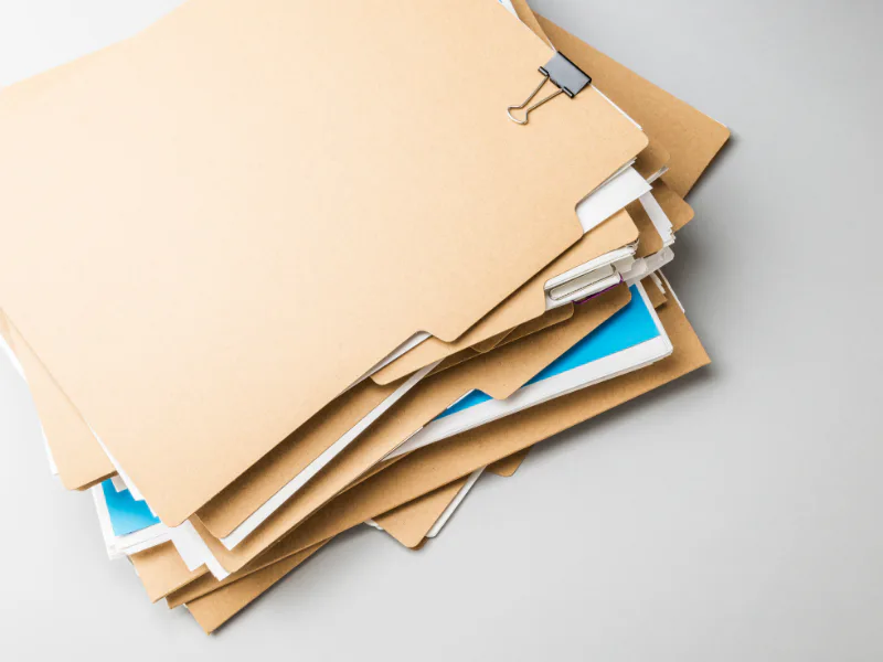 stack of yellow folders