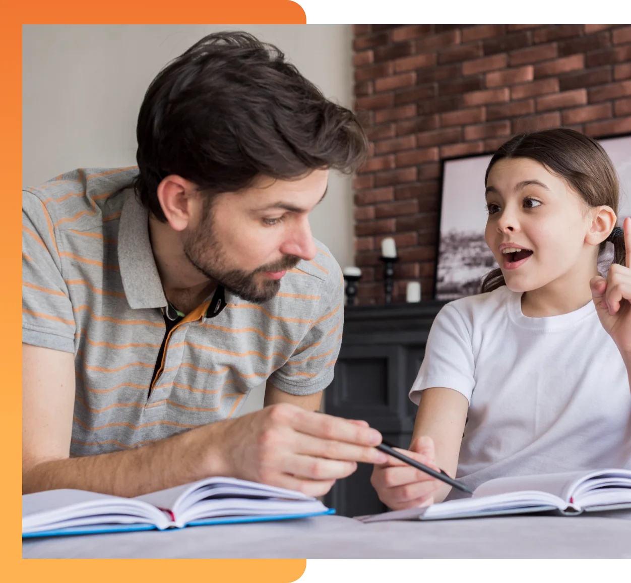 A father pointing at an open notebook while his young daughter looks on with a surprised expression during a homeschool lesson
