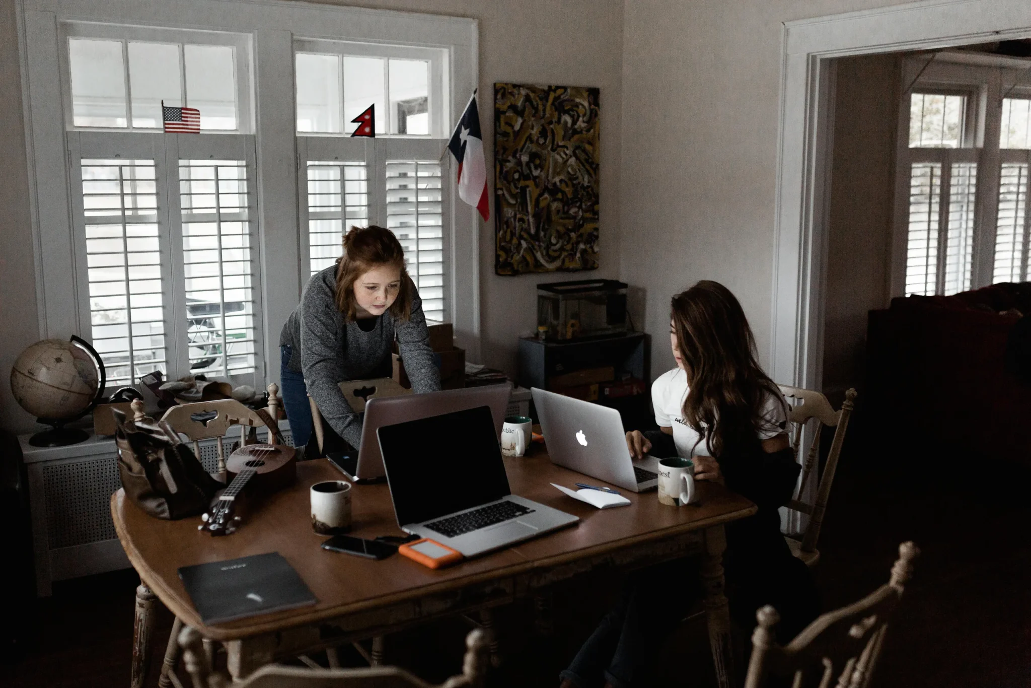 Two people working on a computer