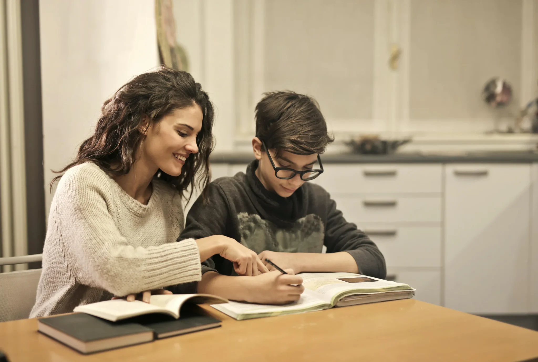 Woman homeschooling a child